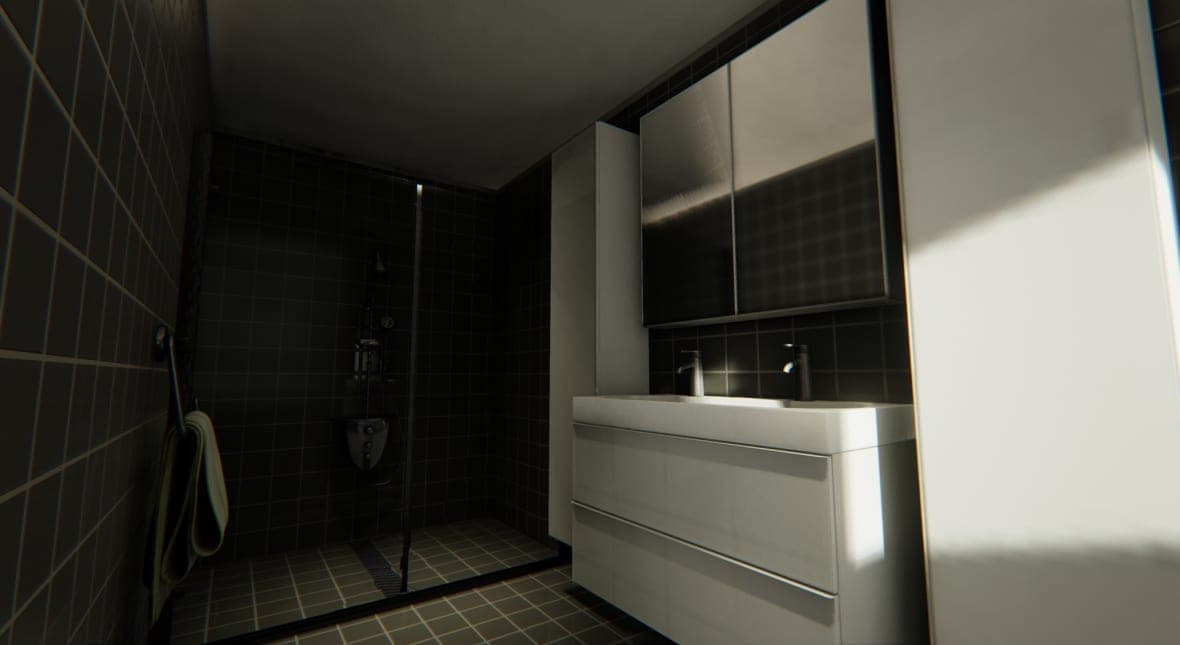 Bathroom in black tile with a white double vanity